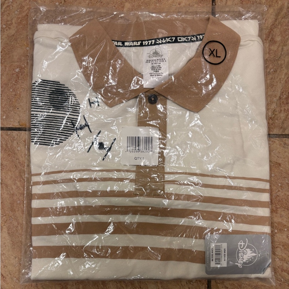 STAR WARS DISNEY POLO!  Brand new still in plastic wrapping!  977 STAR WARS POLO